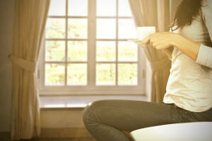woman-with-a-cup-of-tea-in-winter